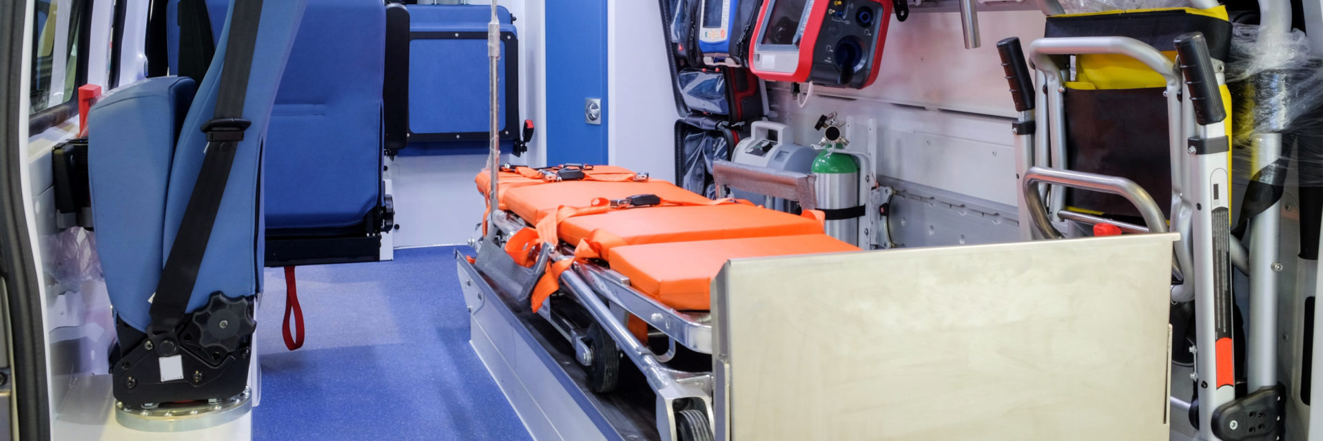 Inside An Ambulance With Medical Equipment For Helping Patients Before Delivery To The Hospital.